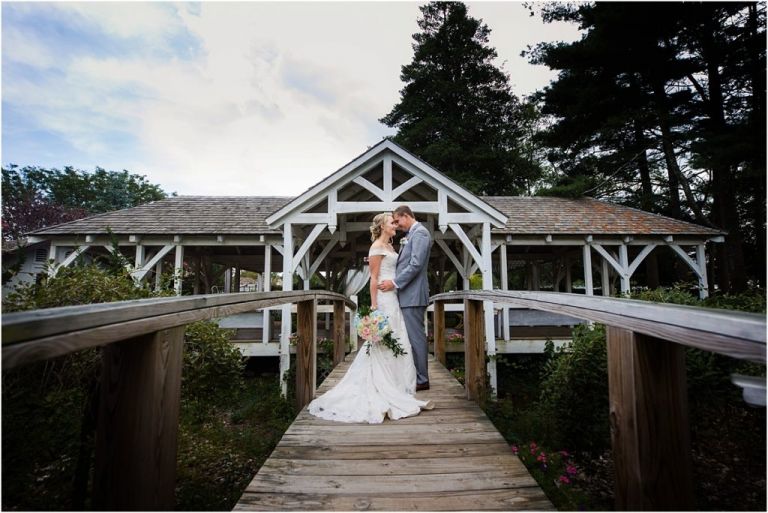 Wedding photo of couple on bridge at Abbie Holmes Estate Wedding