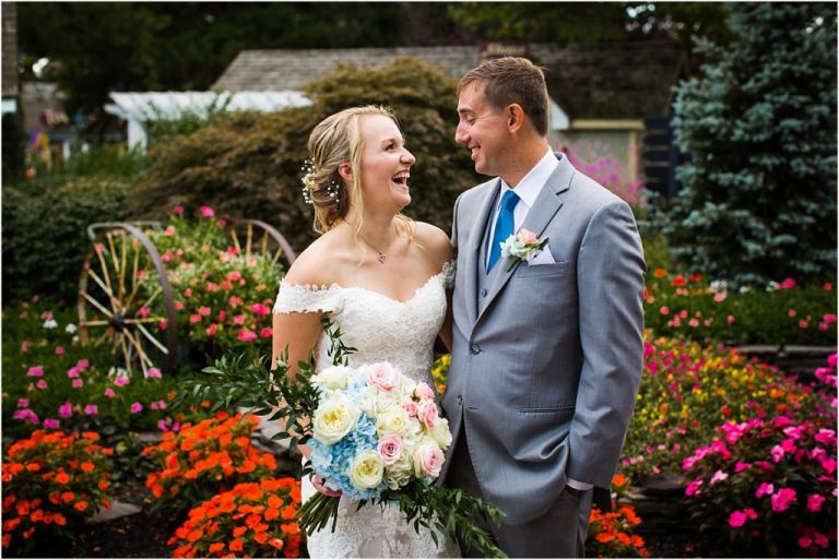NJ photographer captures bride and groom laughing at Abble Holmes Estate wedding