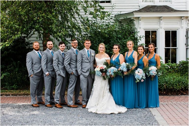 Bridal party photo in front of Abble Holmes Estate wedding venue