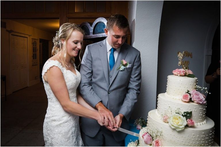 Bride and Groom cut the cake at Abble Holmes Estate wedding in NJ