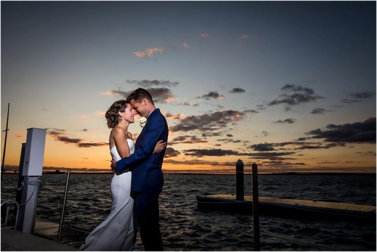 Ocean City Yacht Club wedding photographer gets sunset photo of bride and groom