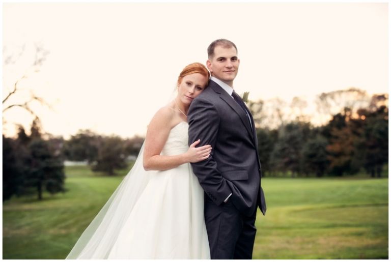 Bride and groom pose for photo at Linwood Country Club Wedding