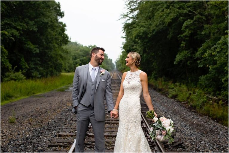 NJ Bride and Groom Laughing at Everly at Railroad wedding 