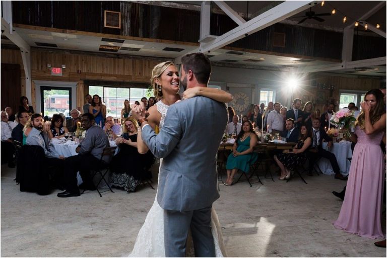 Bride and groom dance during everly at railroad reception