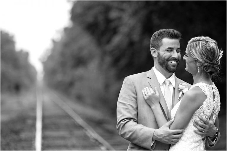Groom smiling at Bride at Everly at Railroad Wedding