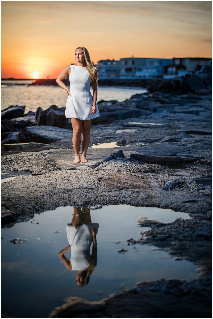 ocean city nj senior photo with water reflection