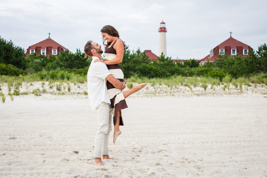 cape may proposal with lighthouse in background